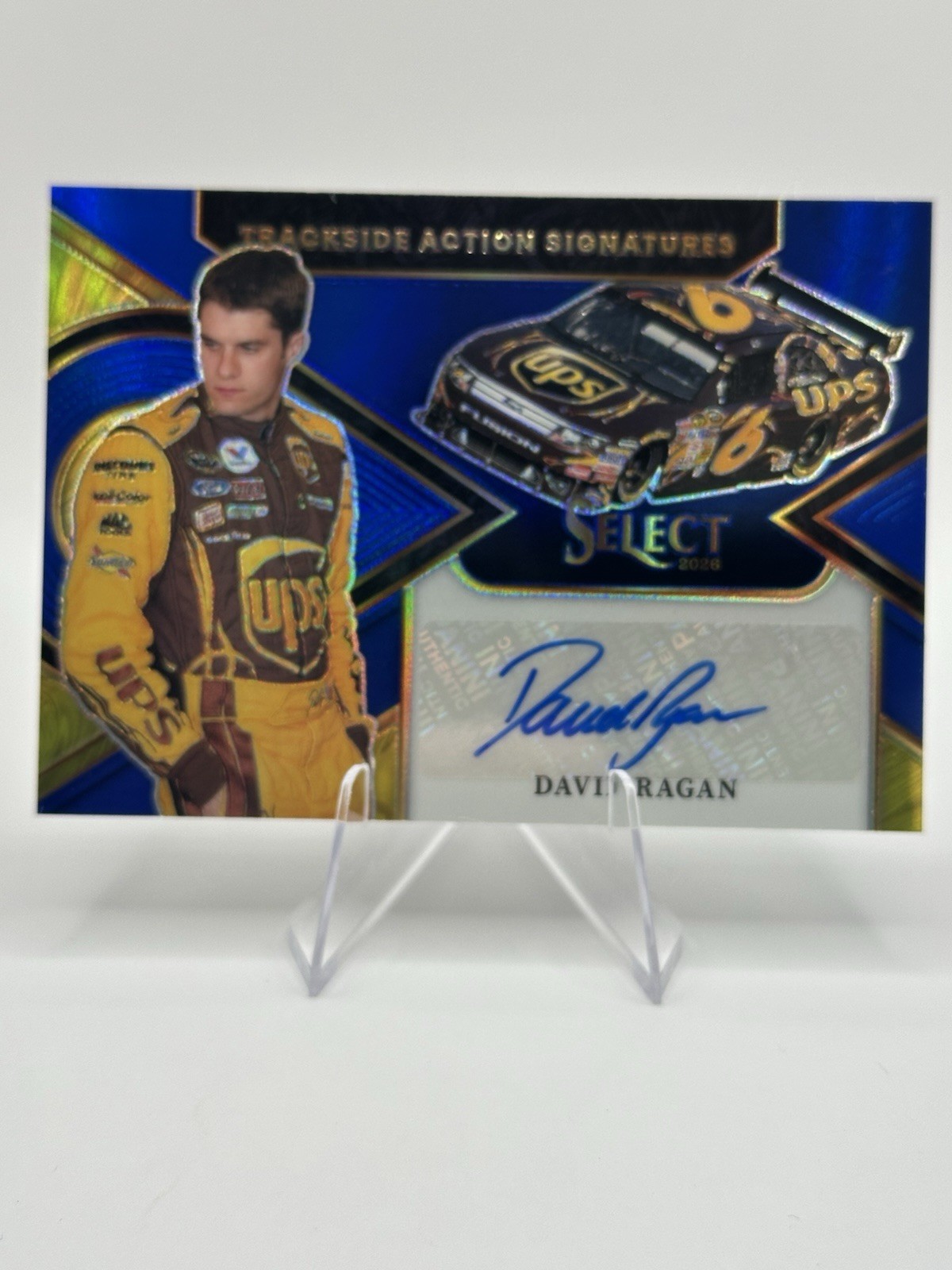 2026 Panini Select Racing David Ragan Trackside Action Auto Blue /99 #TAS-DRG