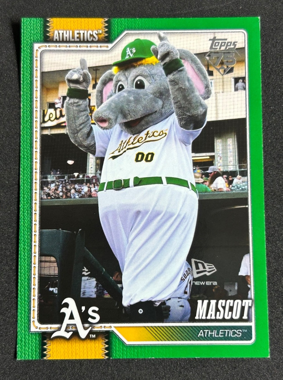 2026 Topps Series 1 Celebration Athletics Mascot Green Border /99