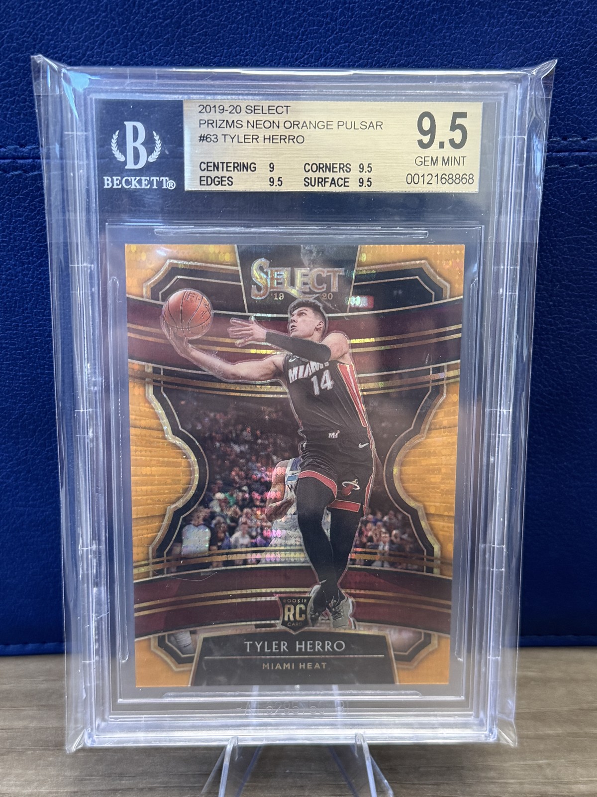 2019-20 Panini Select – Tyler Herro #63 Neon Orange Pulsar Prizm /13 (RC)